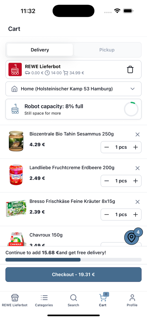 REWE Lieferbot - Warenkorb-Oberfläche der REWE Lieferbot App mit Lebensmitteln, Lieferadresse und Anzeige der Roboter-Kapazität.