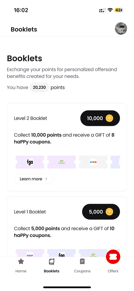 Happy Loyalty app booklets screen showing points balance and available coupon reward levels