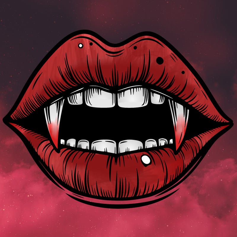 lips with vampire teeth
