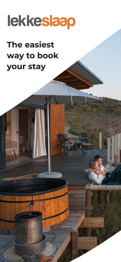 LekkeSlaap - Couple relaxing at a scenic South African lodge booked through the LekkeSlaap app