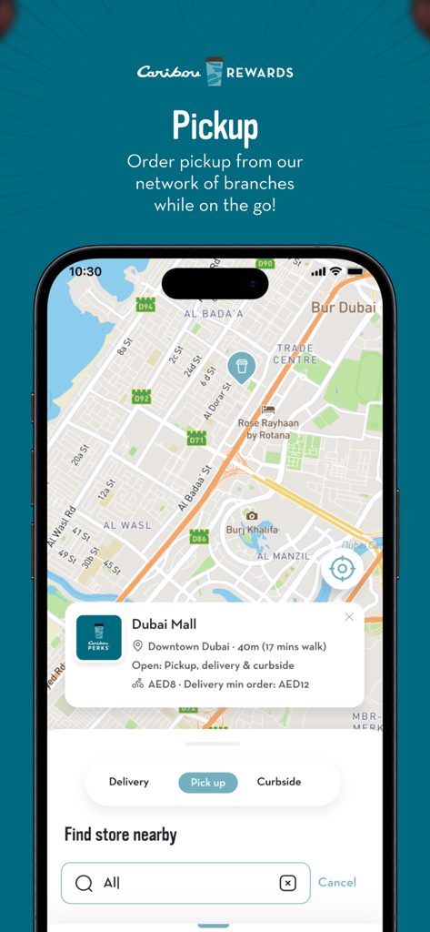 Caribou Rewards - Pantalla de la aplicación Caribou Rewards mostrando una interfaz de mapa para encontrar y seleccionar ubicaciones de cafeterías para recogida y servicio de curbside