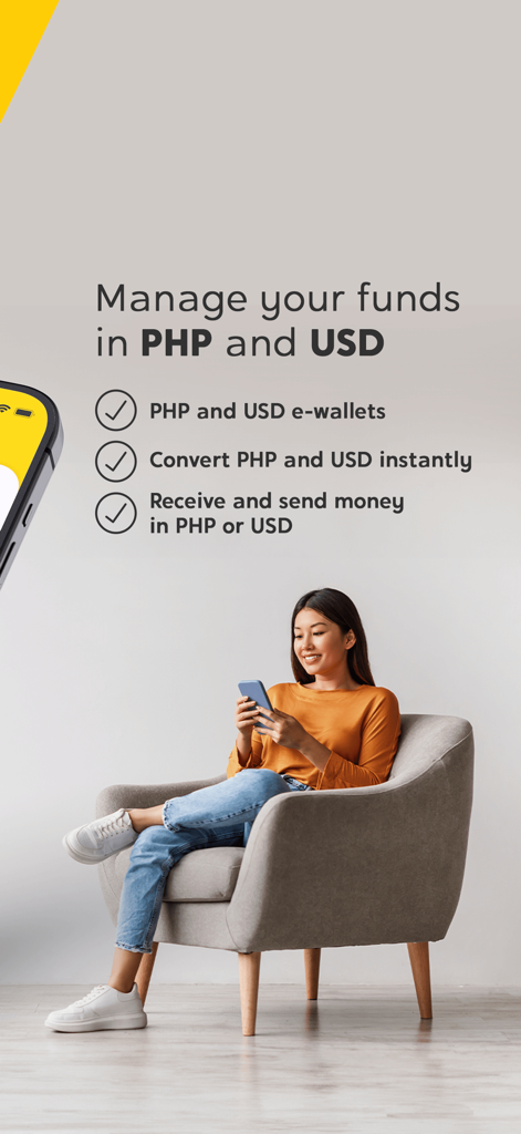 U Mobileアプリを使用してPHPとUSDの資金を管理および変換する女性。