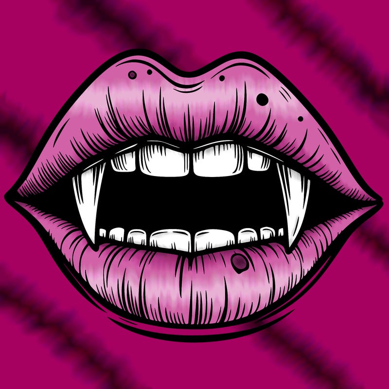 lips with vampire teeth