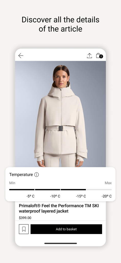 App mobile OYSHO che visualizza dettagli tecnici per una giacca da sci bianca impermeabile.