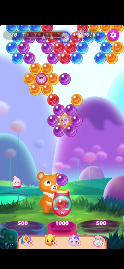 Bear Pop - Bubble Shooter Game - Cute bear character aiming a purple bubble to pop colorful bubbles and rescue fairies in Bear Pop game.