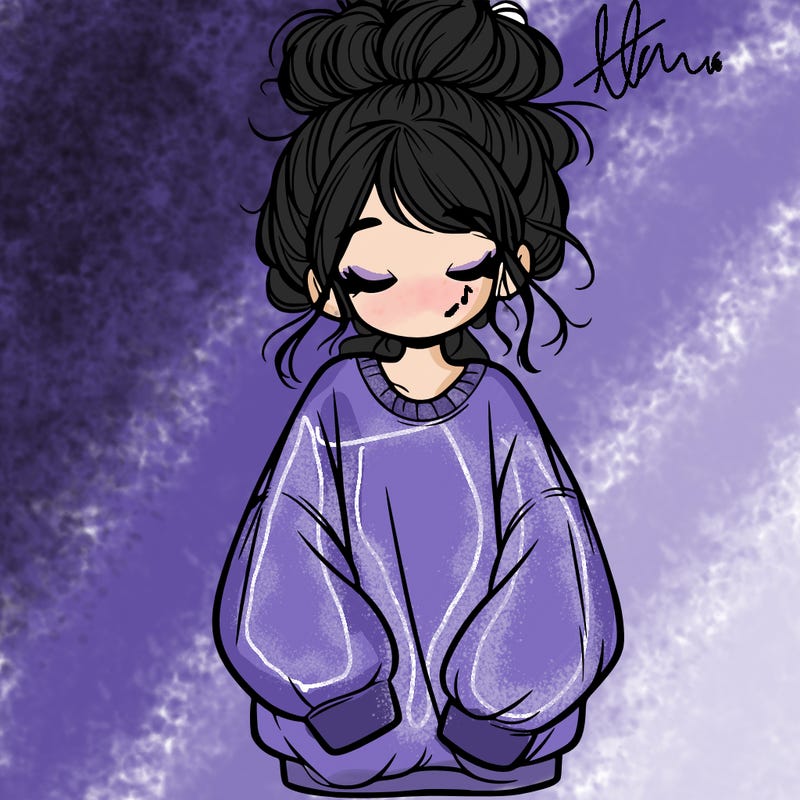 girl with baggy sweatshirt and messy bun