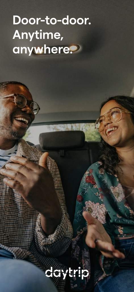 Daytrip: Transfers and trips - A happy couple in the back of a car using Daytrip private transfer service