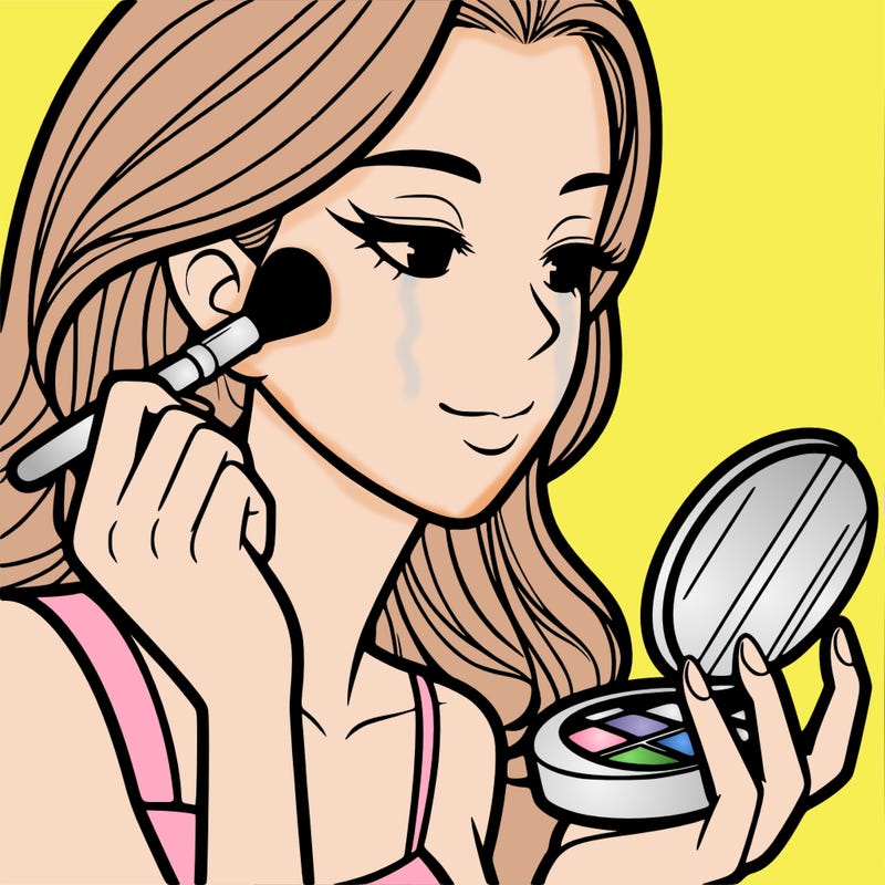 little girl putting on makeup