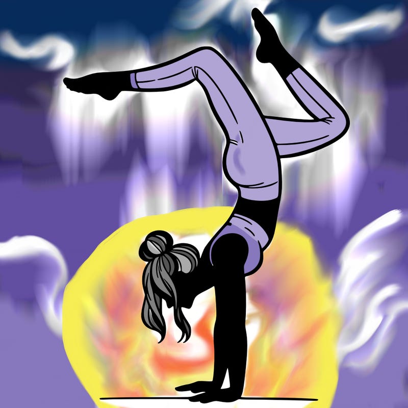 a woman doing a handstand