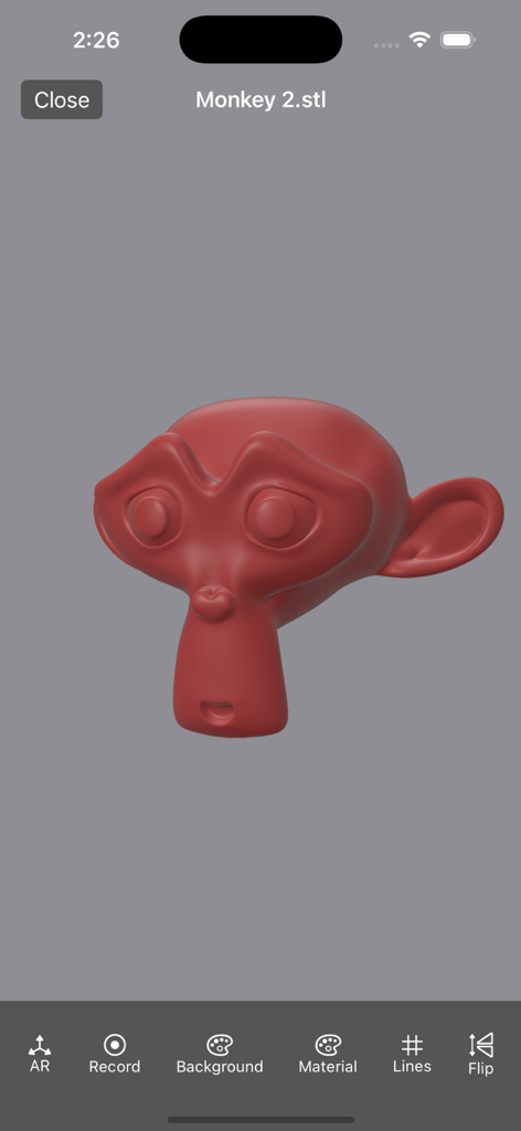 A red 3D monkey head model displayed in the 3D Model Viewer mobile app interface