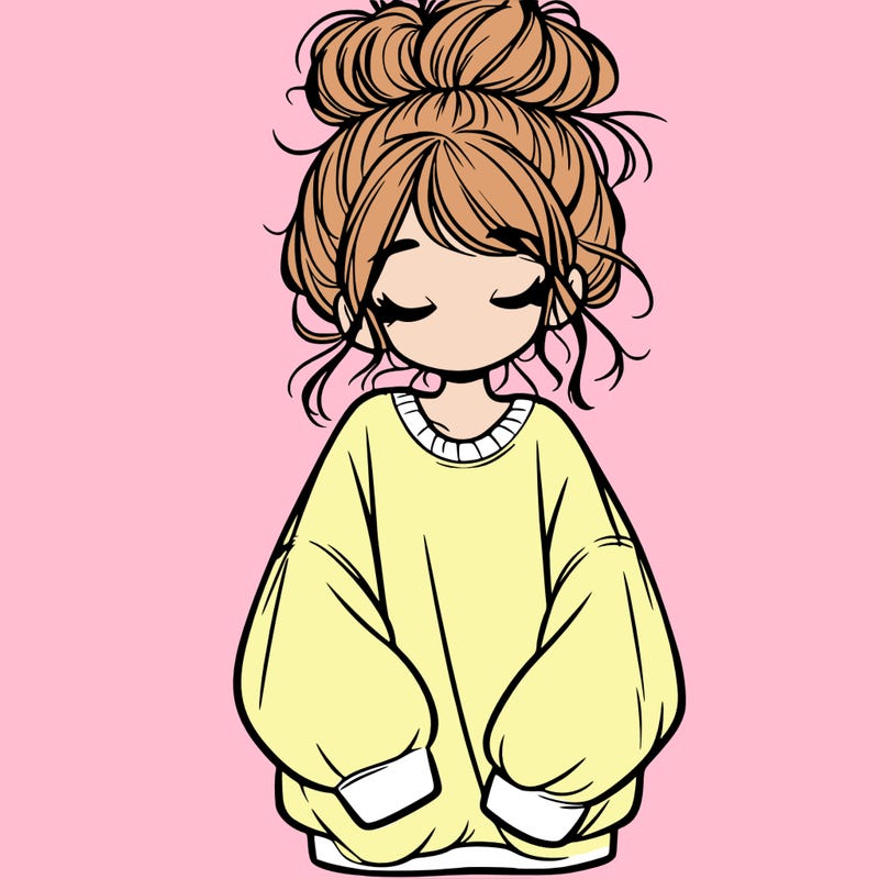 girl with baggy sweatshirt and messy bun