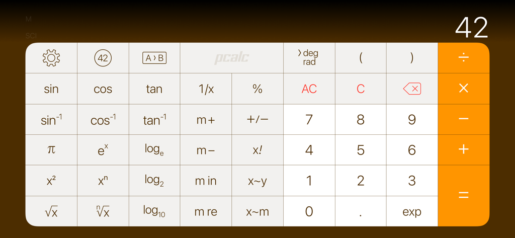 PCalc Lite - PCalc Lite scientific calculator interface in landscape mode showing advanced math functions and a numeric keypad.