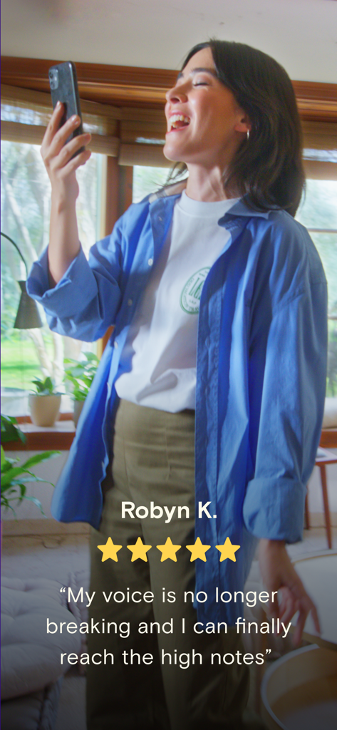 A happy woman singing with her smartphone and a five star review for the Simply Sing app