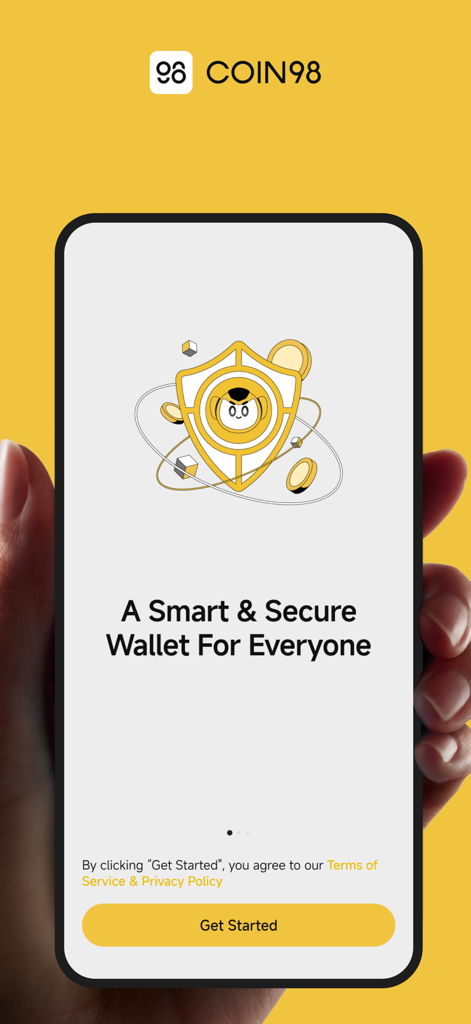 Una mano che tiene uno smartphone che mostra la schermata di benvenuto dell'app Coin98 con un'icona a forma di scudo e il testo Un portafoglio intelligente e sicuro per tutti.
