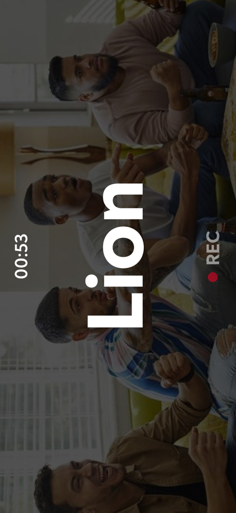 Charades & Headbands - GuessUp - A group of friends playing the GuessUp charades game with the word Lion displayed on the screen during a recording session.