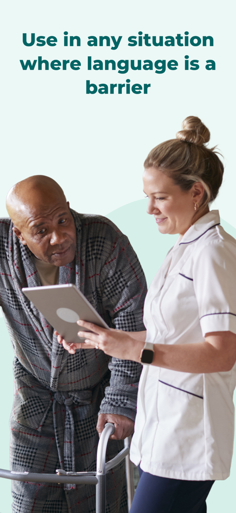 A healthcare worker using the Care to Translate app on a tablet to communicate with an elderly patient.