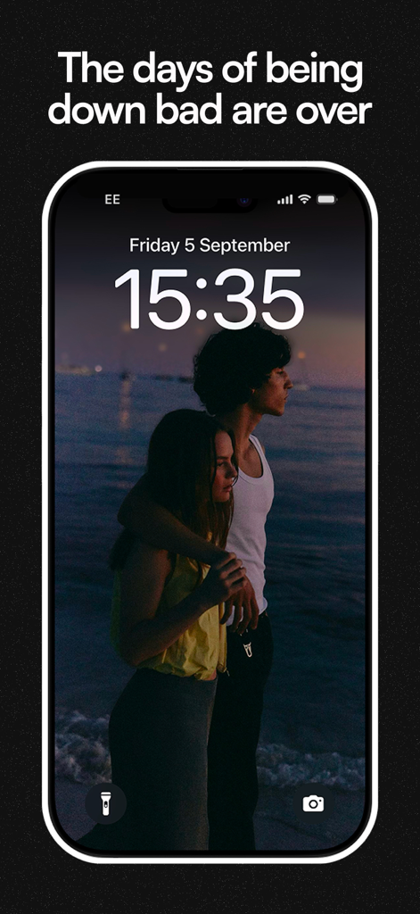 A smartphone lock screen showing a romantic couple on a beach with the headline The days of being down bad are over