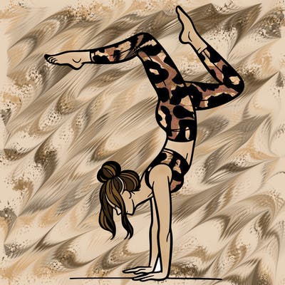 a woman doing a handstand