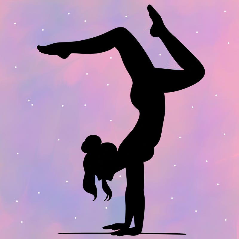 a woman doing a handstand