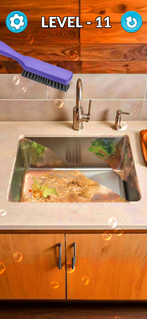 Satisfying Home Deep Cleaning - Uma pia de cozinha virtual suja sendo esfregada com uma escova roxa em um jogo satisfatório de limpeza.
