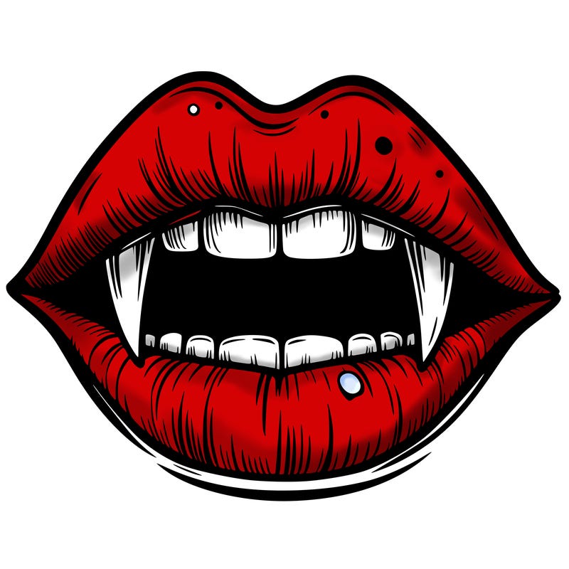 lips with vampire teeth
