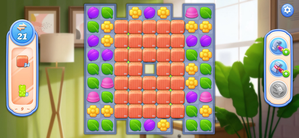 Flower Shop Makeover - A match-3 puzzle level in Flower Shop Makeover featuring colorful flower-themed tiles and game boosters