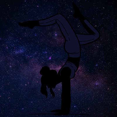 a woman doing a handstand