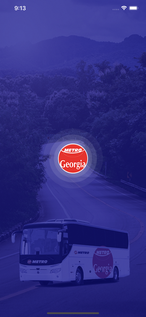 Metro Georgia - Metro Georgia app splash screen featuring a modern bus on a scenic mountain road