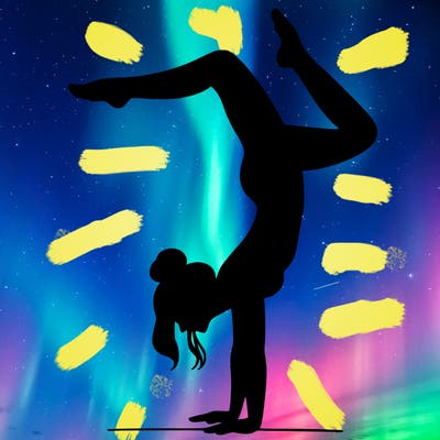 a woman doing a handstand