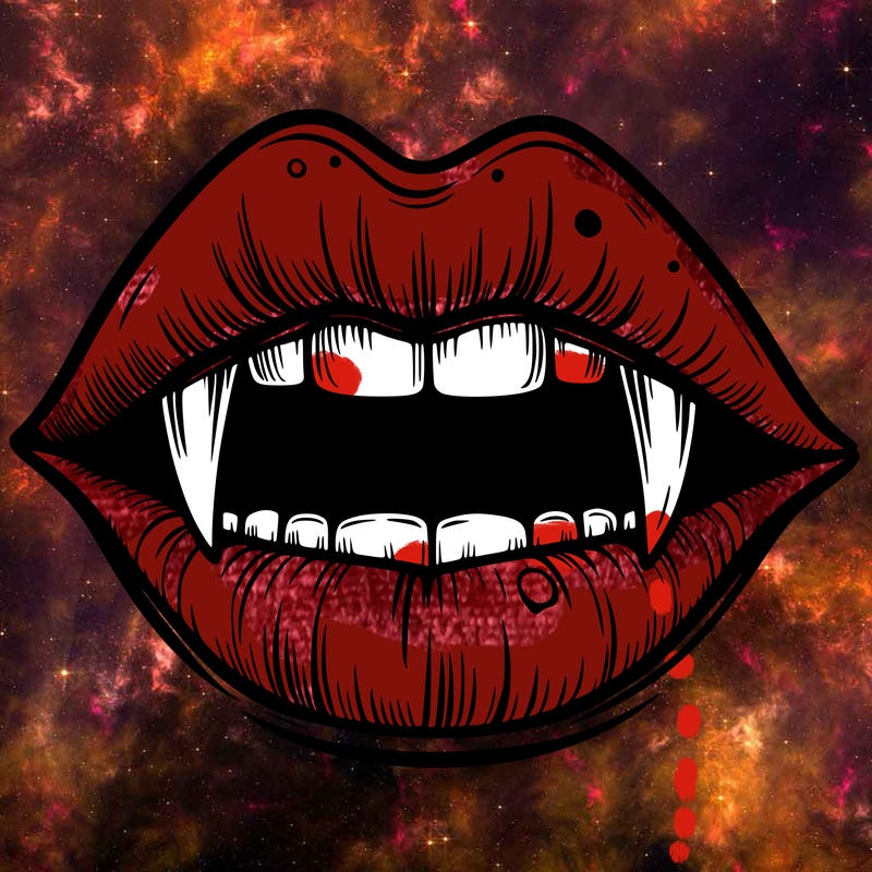 lips with vampire teeth