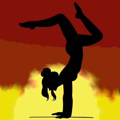 a woman doing a handstand