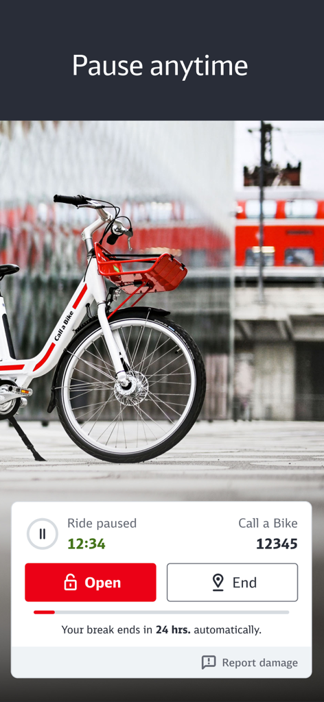 Call a Bike - A white and red Call a Bike bicycle parked with an app interface showing the ride paused feature.