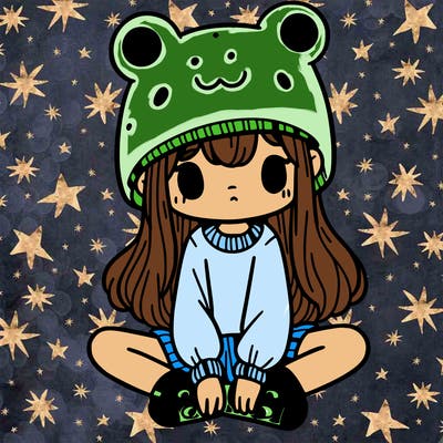 a girl wearing a frog hat and some frog socks