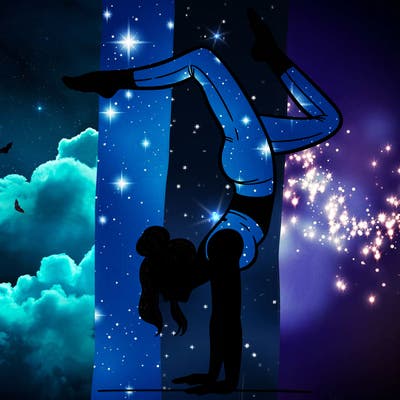 a woman doing a handstand