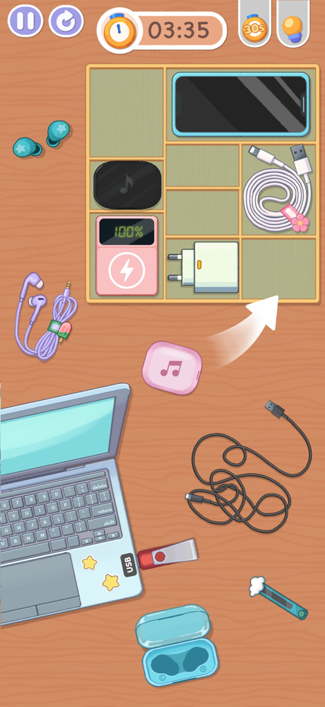 Tidy Up - Satisfeel ASMR - Una pantalla de juego móvil que muestra varios aparatos tecnológicos como un teléfono y un cargador siendo organizados en una bandeja compartimentada de madera