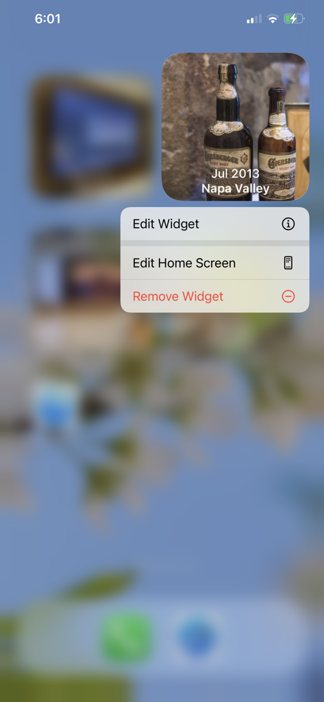 Photo Albums and Widget - An iPhone home screen displaying a photo widget of Napa Valley wine bottles with a customization menu open