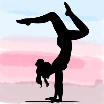 a woman doing a handstand