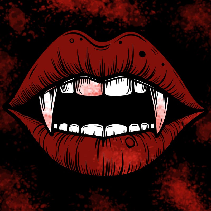 lips with vampire teeth