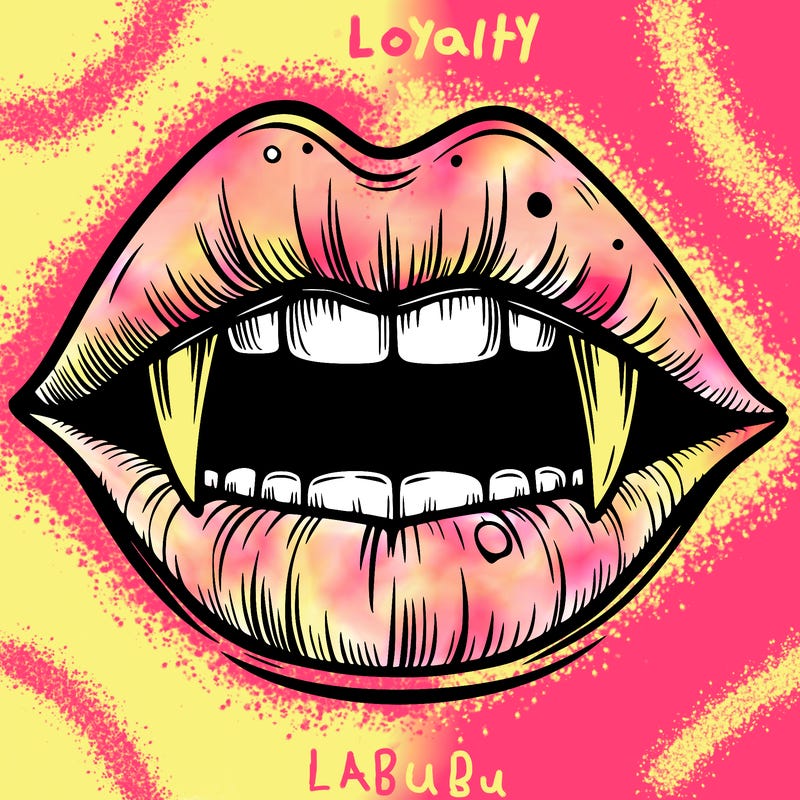 lips with vampire teeth