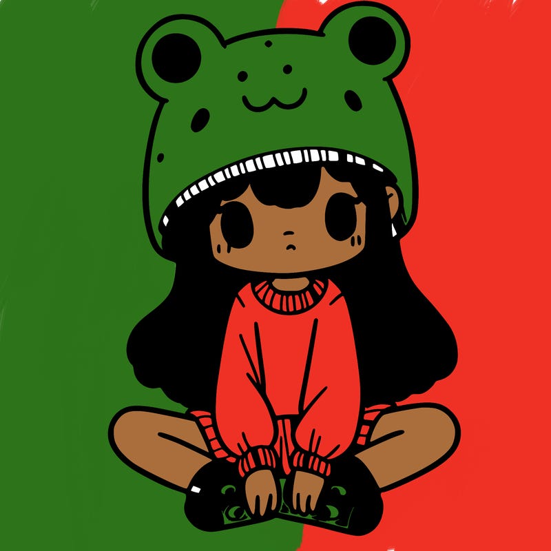 a girl wearing a frog hat and some frog socks