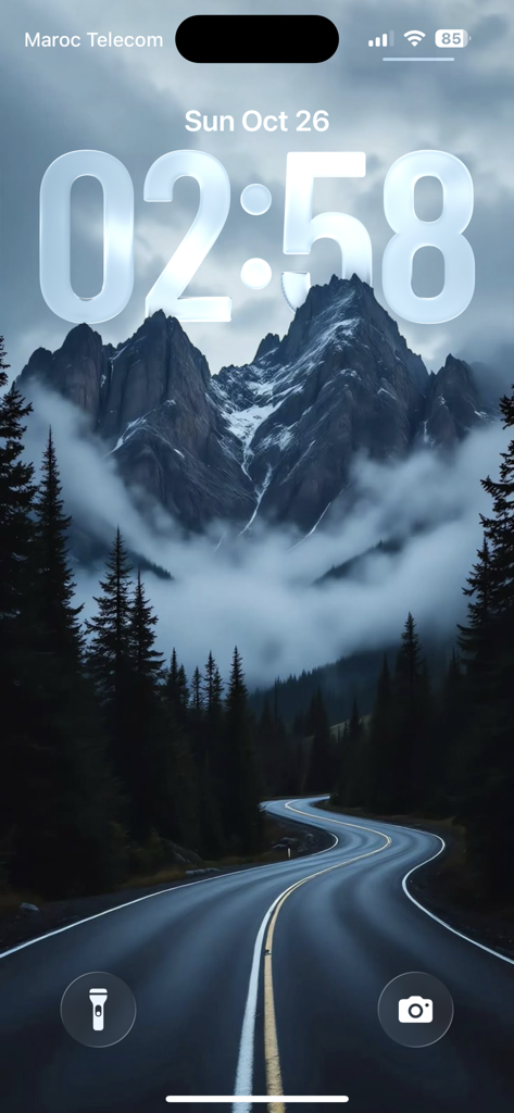 An iPhone lock screen displaying a 4K nature wallpaper with a mountain peak overlapping the time using the depth effect.