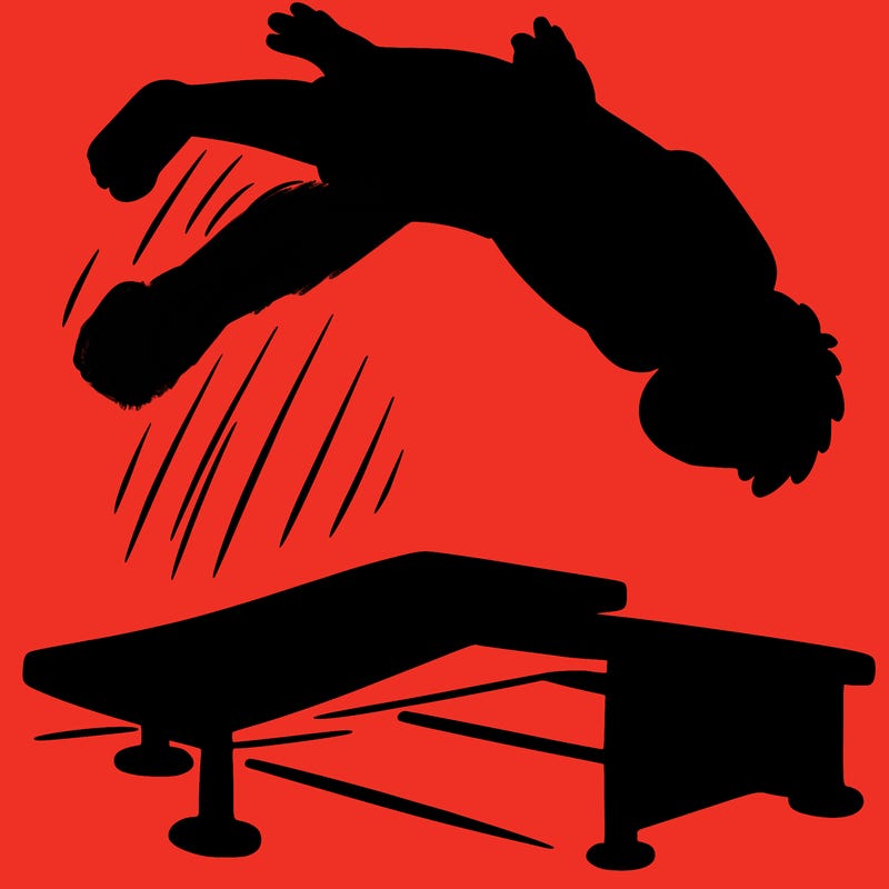 boy doing a backflip off a diving board