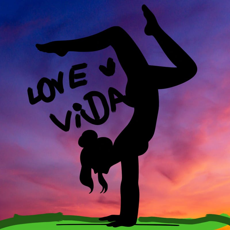 a woman doing a handstand