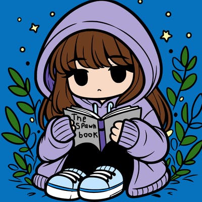 girl in oversized hoodie reading a book