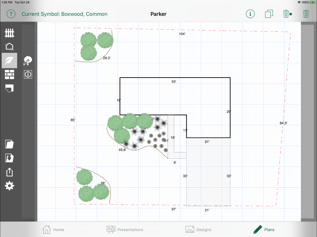A 2D scaled site plan drawing in the PRO Landscape Companion app showing dimensions and plant symbols on a grid.