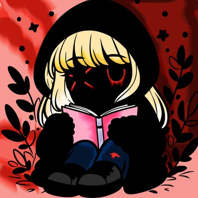 girl in oversized hoodie reading a book