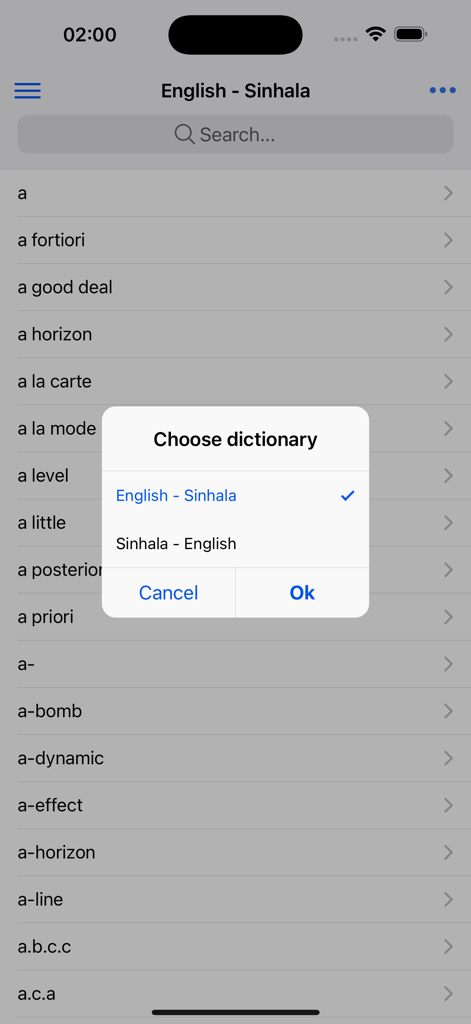User interface of the Sinhala English Dictionary app showing a pop up to choose between English to Sinhala and Sinhala to English translation modes.