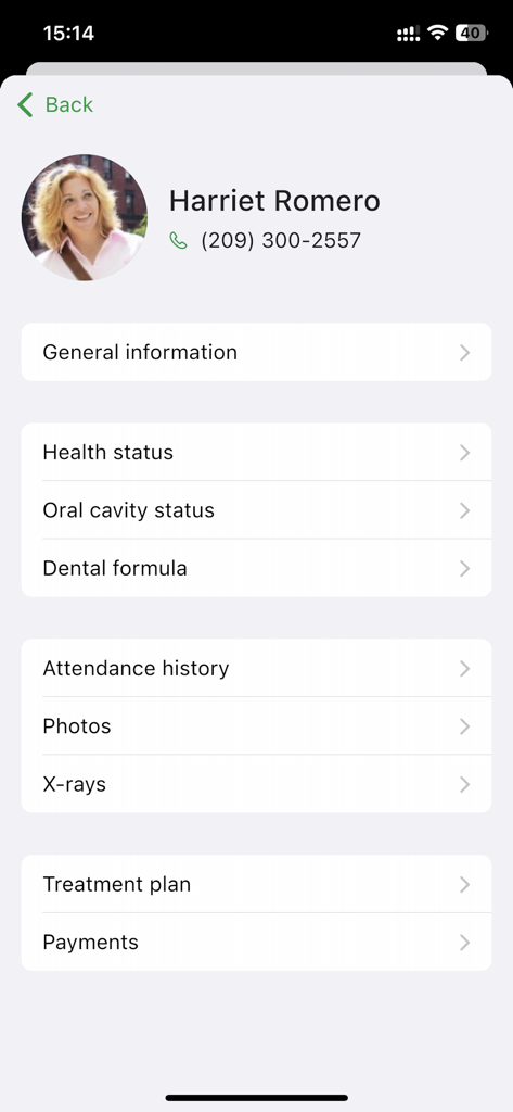 Dentist Book - Patient profile screen in Dentist Book app showing dental records and treatment options
