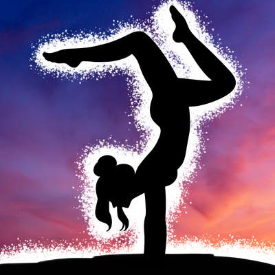 a woman doing a handstand