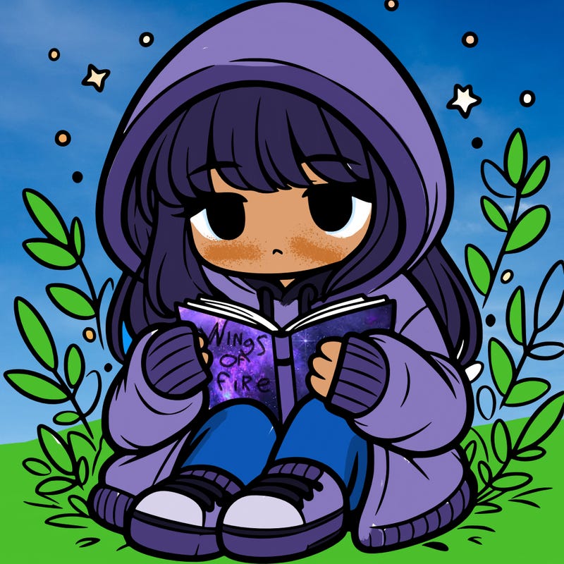 girl in oversized hoodie reading a book